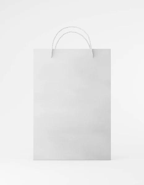 Sac d'emballage éco papier kraft avec poignée face avant. Modèle blanc moyen standard sur fond blanc publicité promotionnelle. rendu 3D — Photo