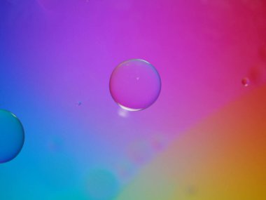 Kapalı makro yağ damlaları tatlı renkli arka plan, güzel soyut baloncuklar yağ, pastel arka planda damlacıklar