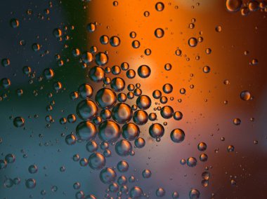 Güzel soyut baloncuklar suda yağ siyah turuncu parlak arka plan, makro görüntü, tatlı renk, bulanık damlacıklar