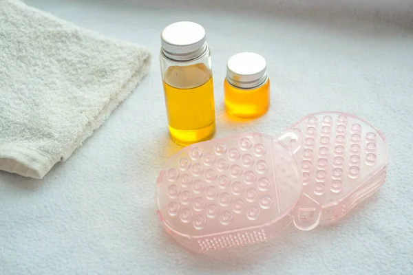 body oil, brush for body, towel, body oil bottle, massage, oil, cosmetics, beauty