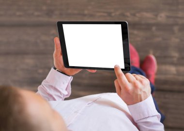 Man using tablet. Tablet horizontal screen mockup. clipart