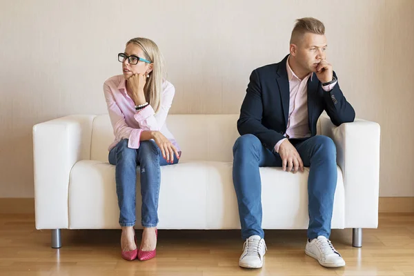 Sad Couple Sitting Couch Looking Different Directions — Stock Photo, Image