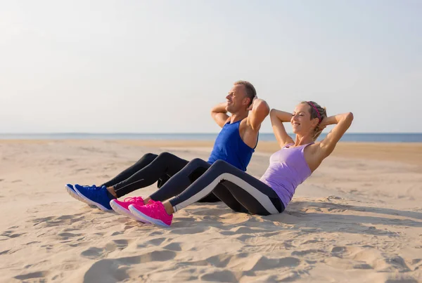 Couple Working Out Sea — Stock Photo, Image