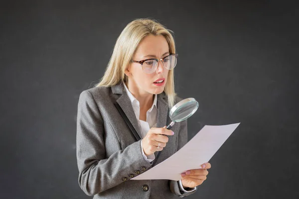 Woman Carefully Reading Business Contract Magnifying Glass — Stock Photo, Image