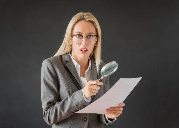Woman Reading Business Contract Magnifying Glass — Stock Photo, Image