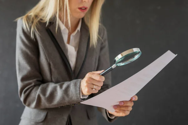 Woman Carefully Reading Business Contract Magnifying Glass — Stock Photo, Image