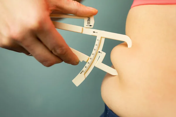 Woman Measuring Her Body Fat Caliper — Stock Photo, Image