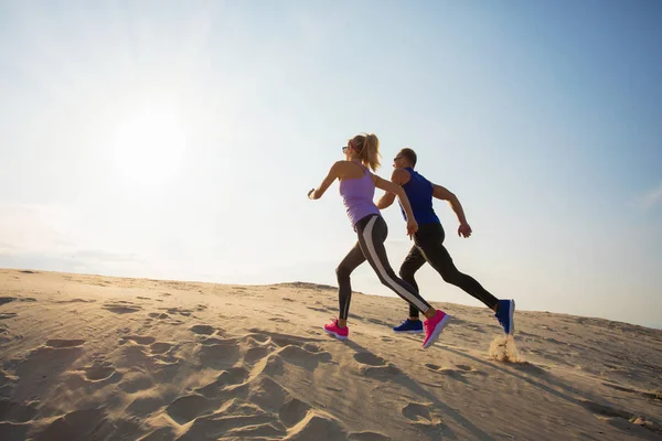 Fit Happy Young Couple Running Outdoors — Stock Photo, Image