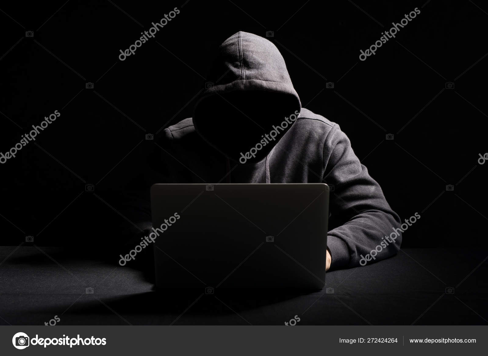 depositphotos_272424264-stock-photo-hacker-working-laptop-dark.jpg