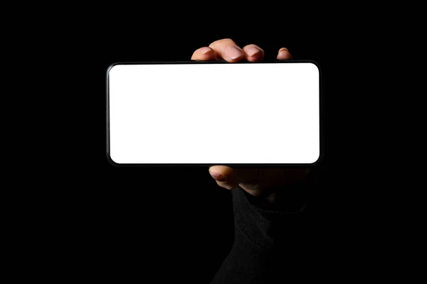 Osoba Trzymająca Ręku Smartfona Pustym Białym Ekranem Zdjęcie Odizolowane Czarnym — Zdjęcie stockowe