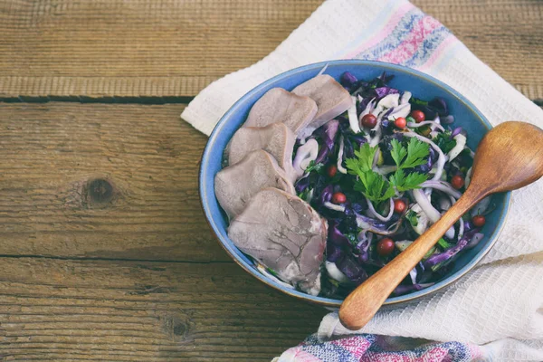 Stewed purple cabbage with parsley and boiled tongue. Breakfast, lunch or dinner. Autoimmune Paleo. Diet healthy food concept. Cereals Gluten Dairy free. Copy space