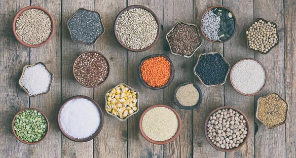 Cereals, grains, beans and seeds. Millet, quinoa, corn, buckwheat, rice, amaranth, chickpea, coconut chia soy oats lentils Gluten-free concept Healthy food Top view Copy space