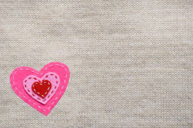 Kalpler örme doku hissettim. Sevgiliye arka plan veya tebrik kartı kavramı