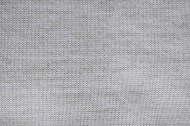 Gri arka plan ördü. Yüzey yün doku. Metniniz için kopya alanı.