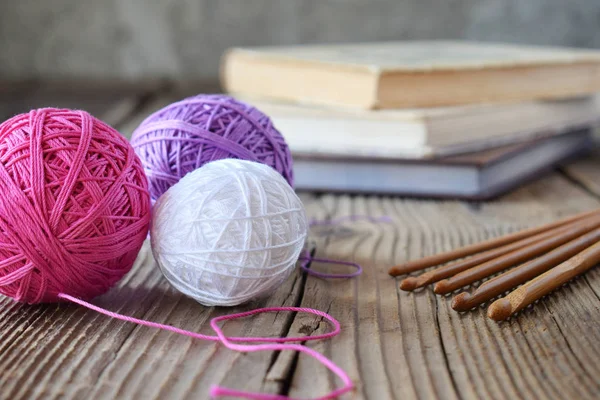 The equipment for knitting and crochet hook, colorful rainbow cotton yarn, ball of threads, wool. Handmade crocheting crafts. DIY concept. Copy space — Stock Photo, Image