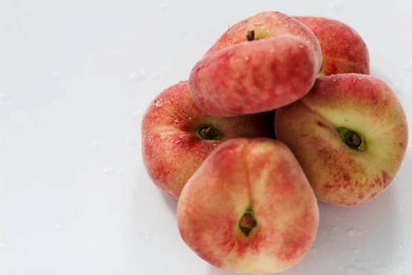 peaches against white background.