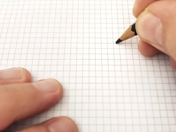 Escrevendo Com Lápis Uma Folha Papel Quadrado — Fotografia de Stock