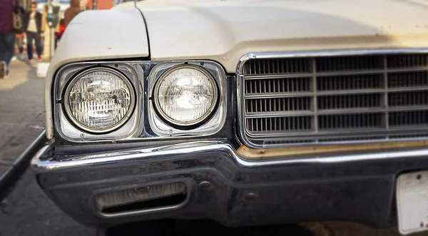 Round front headlights of an antique car — Stock Photo, Image