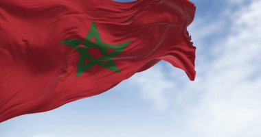Morocco national flag waving in the wind on a clear day. Red flag with a green pentagram in the center. 3d illustration render. Rippled fabric. Selective focus