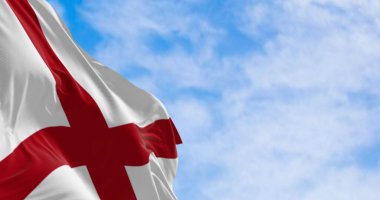 Güneşli bir günde Alabama eyalet bayrağının yakın çekimi. Alabama bayrağında beyaz bir tarlada kırmızı bir haç var. 3D illüstrasyon sunucusu, Çırpınan kumaş.