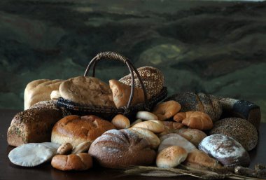 Bodegn de panes sobre fondo de pinturas clipart