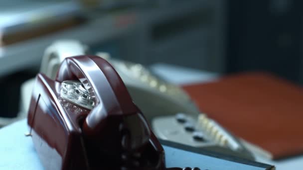 Businessman dialing a number on a vintage phone — Stock Video