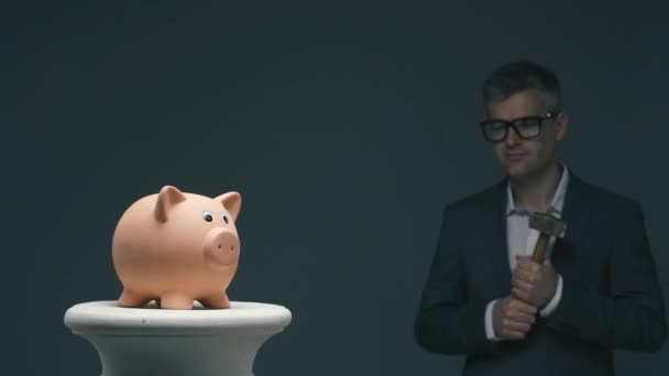 Confident Businessman Holding Hammer Piggy Bank Break Savings Investments Deposit — Stock Video