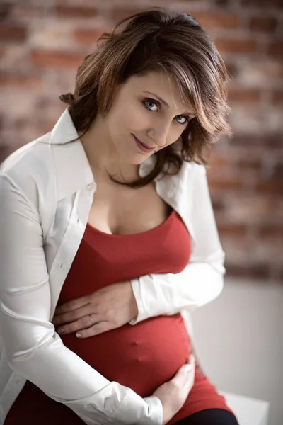 Happy young mother posing at home — Stock Photo, Image