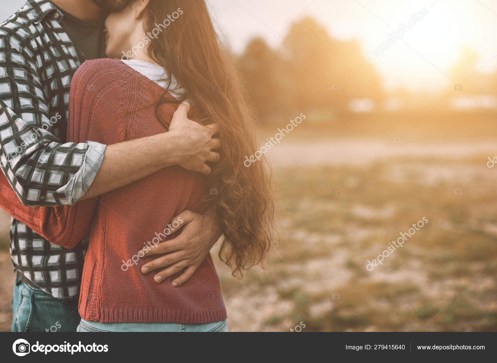 Young loving couple hugging outdoors Stock Photo by ©stockasso ...