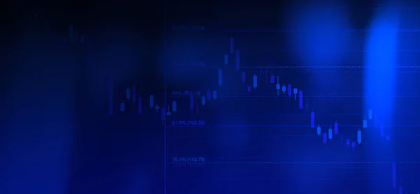 Borsa veya ticari finans grafiği mavi arkaplan renginde bilgisayar monitöründe