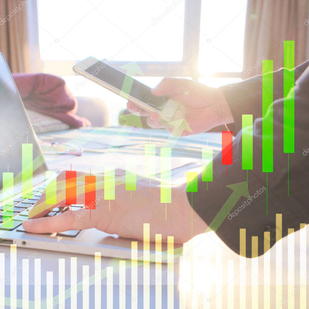 stock trader with stock chart candle stick and volume bar diagram, stock trader analyzing stock graph concept