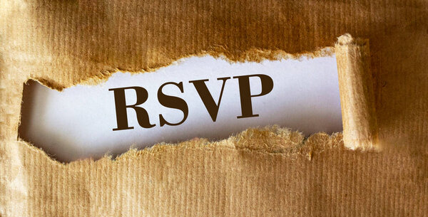 RSVP word on brown torn paper texture background