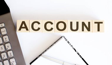 iş konsepti metin ahşap blok ACCOUNT dizüstü bilgisayar ve not defteri ile