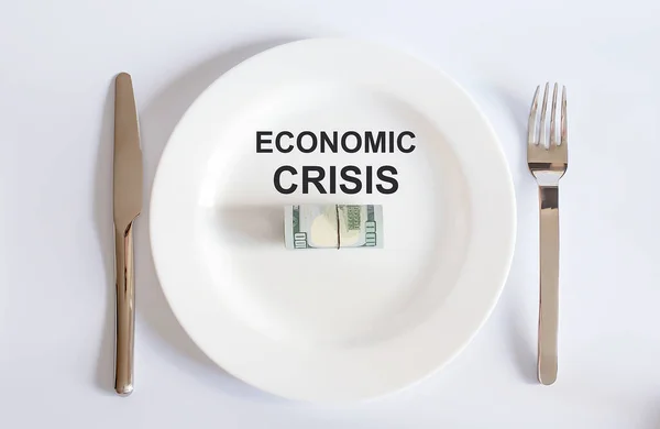 ホワイトプレート上のデフォルトの記号と米ドルの通貨概念写真の経済危機 — ストック写真