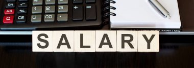 SALARY - Ahşap blokta iş konsepti metni