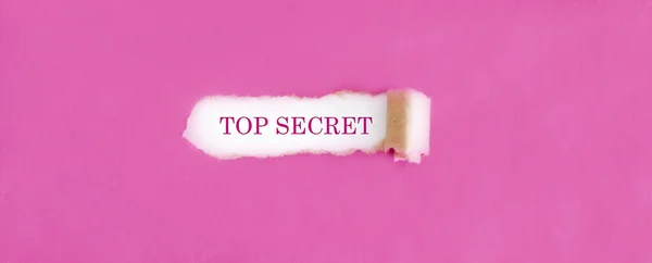 Testo Top Secret Appare Dietro Carta Rosa Strappata — Foto Stock