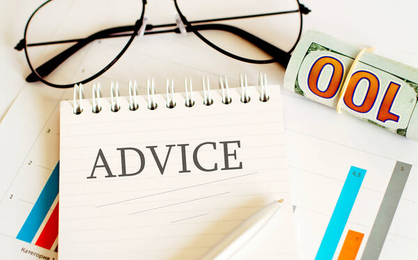 TEXT ADVICE written on memo notebook.