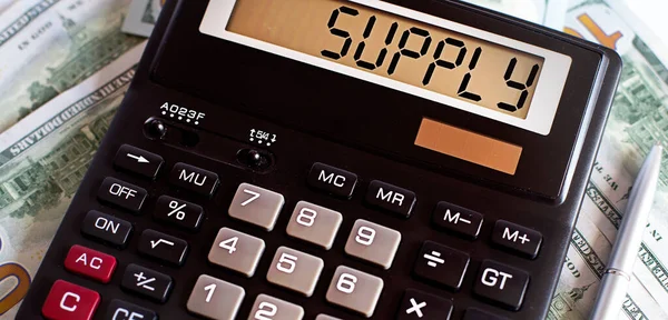 Calculator with the word SUPPLY on display
