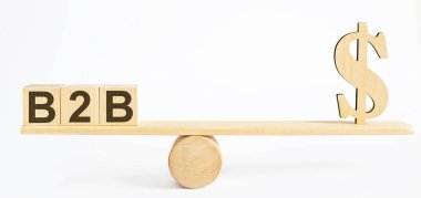 Tahta Dolar ve tahta bloklardaki B2B yazıları. Denge.