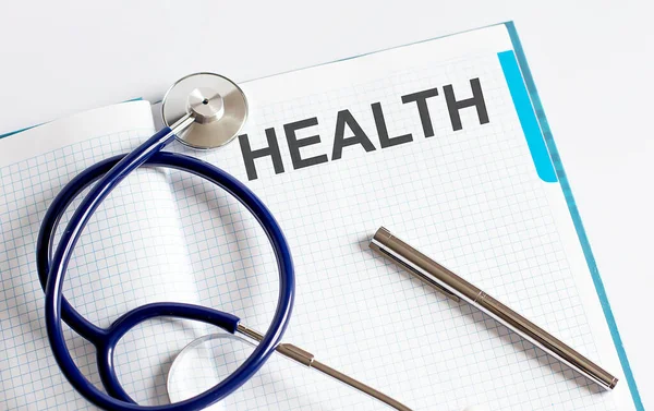 Papír Szöveggel Egészségügyi Táblázat Sztetoszkóppal — Stock Fotó