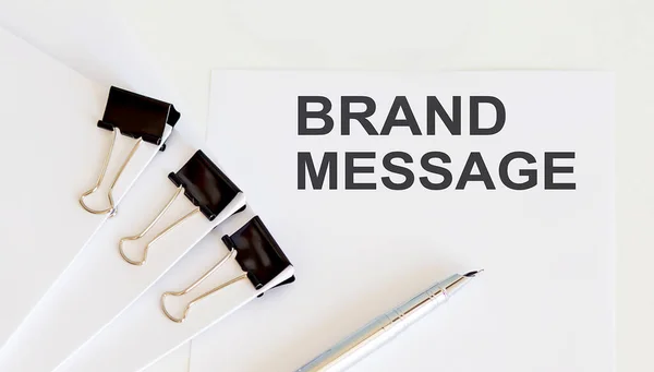 BRAND MESSAGE written on a white page