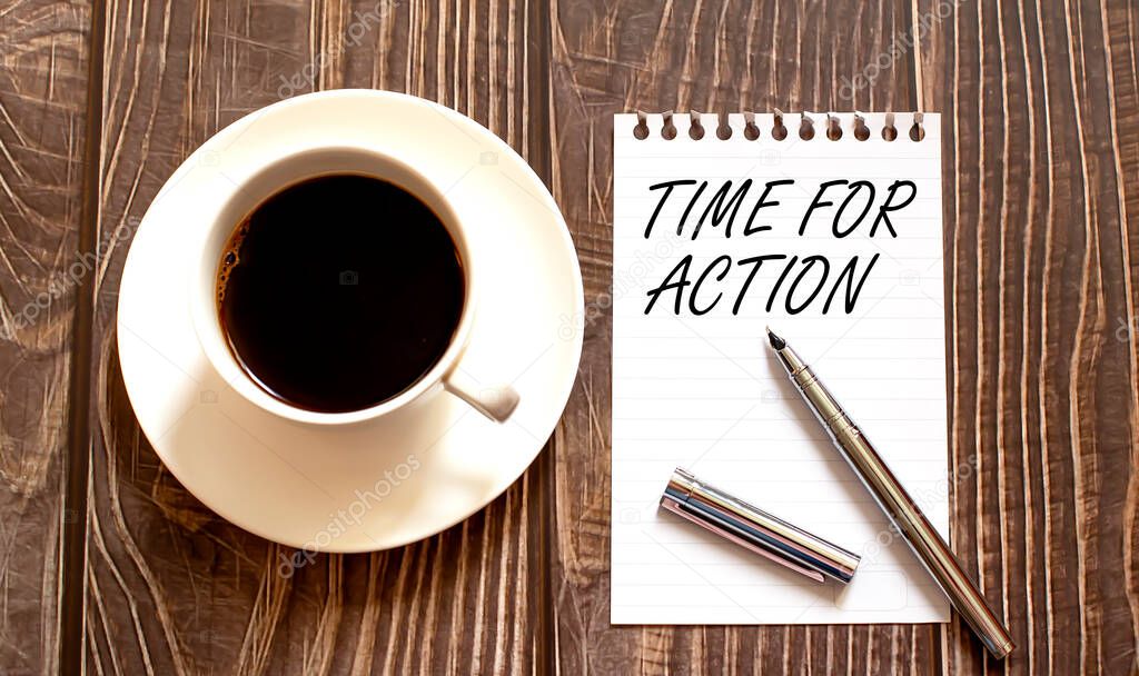 TIME FOR ACTION - white paper with pen and coffee on wooden background. Business