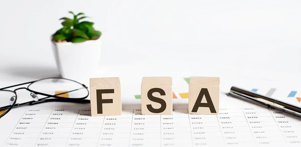 Fsa Word Concept Written Wooden Blocks Cubes Light Table Flower — Stock Photo, Image