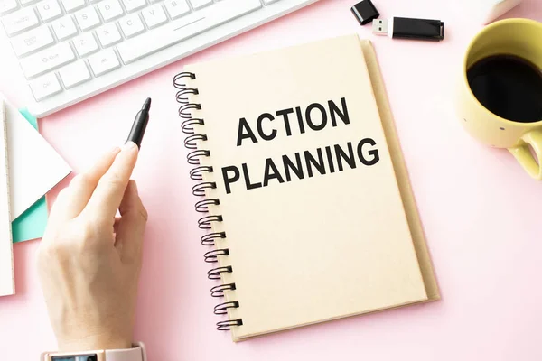 Prepare the action plan in a writing pad isolated