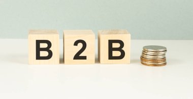 B2B, ticaretten iş pazarlamasına, ahşap küplerle ilgili iş sözcüğü bulanık arkaplan, afiş, metin için kopyalama alanı