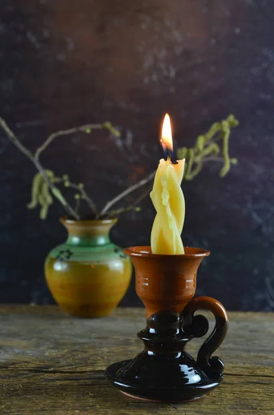 Burning Wax Candle Clay Candle Holder Flowering Hazel Branch Background — Stock Photo, Image