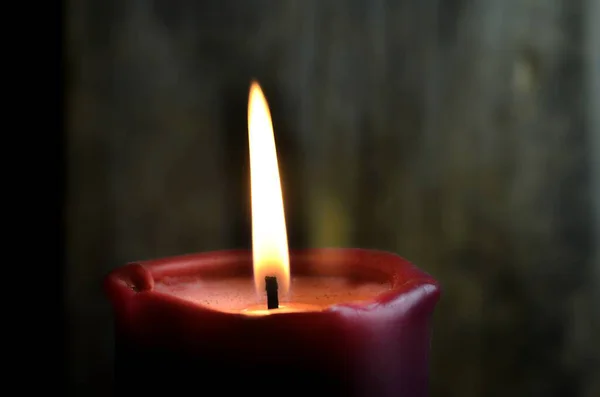 Burning Single Red Candle Dancing Flame Dark Background — Stock Photo, Image