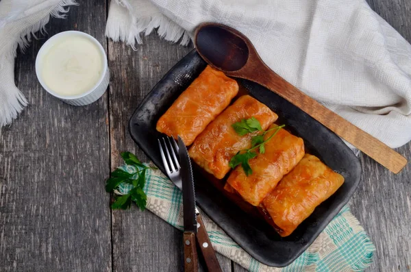 Cabbage rolls stuffed with ground meat and rice. Delicious homemade stuffed cabbage leaves with meat, rice and spices