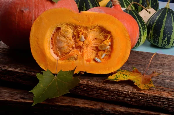 Cut Half Orange Pumpkin Wooden Board Background — Stock Photo, Image