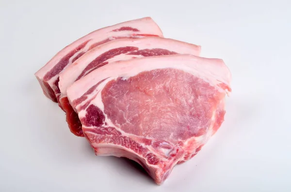 Roh Geschnittenes Schweinesteak Isoliert Auf Weißem Hintergrund Ansicht Von Oben — Stockfoto